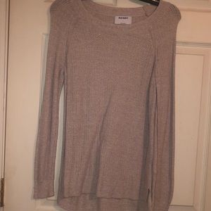 Woman’s cream colored sweater size S, fits up to a size large